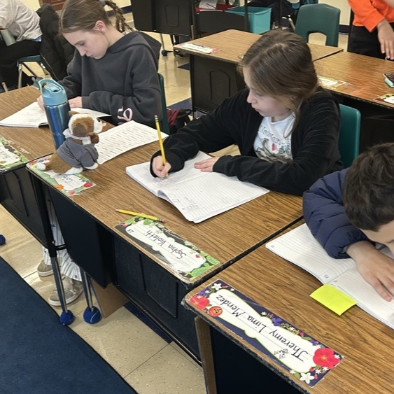 Students in 5Jo work together to create new words using 4 Greek and Latin roots.