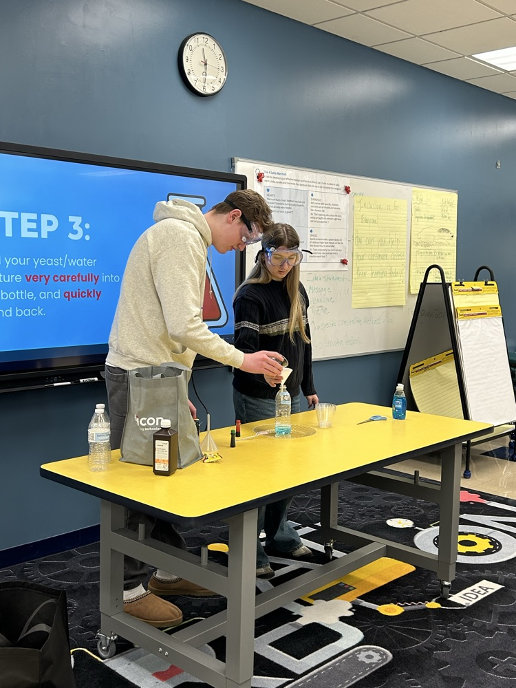 STEM Starters Club group doing elephants toothpaste experiment