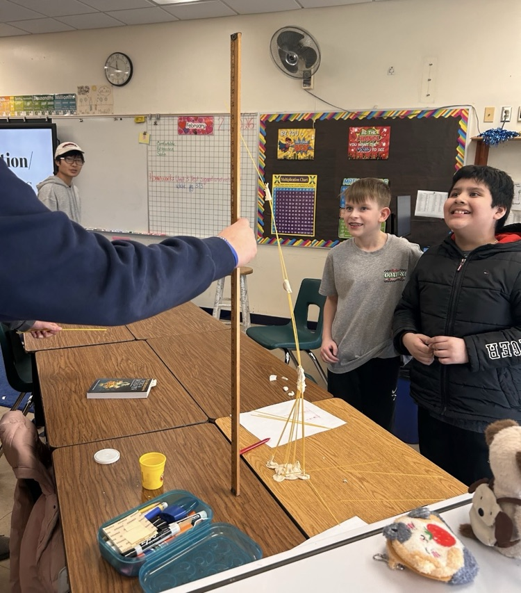 STEM Starters Club group doing spaghetti tower building challenge