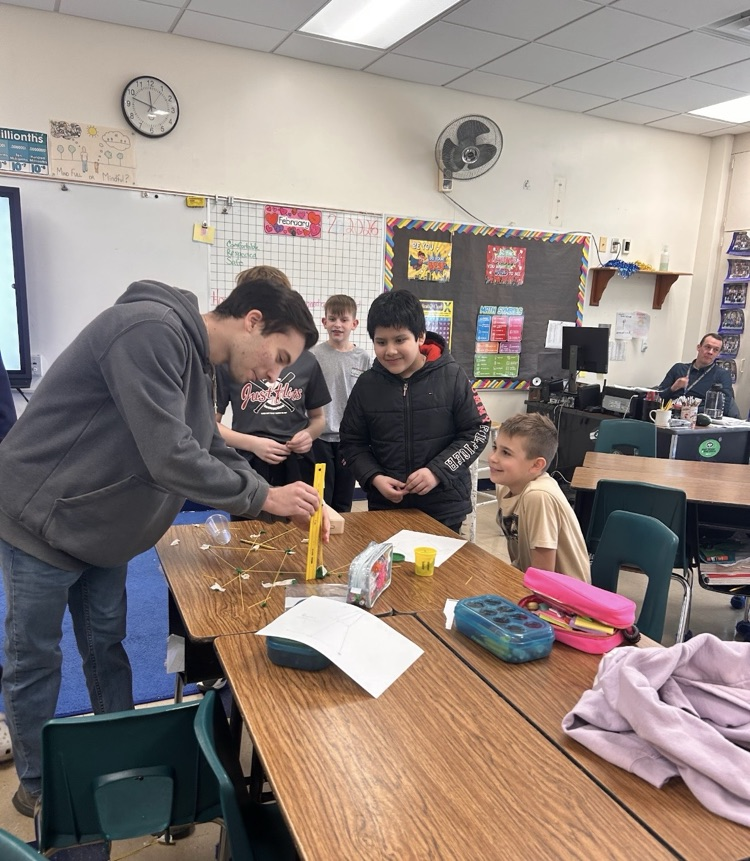 STEM Starters Club group doing spaghetti tower building challenge
