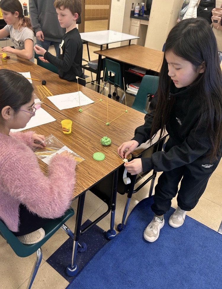 STEM Starters Club group doing spaghetti tower building challenge