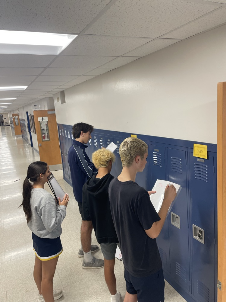 Students practicing review BINGO