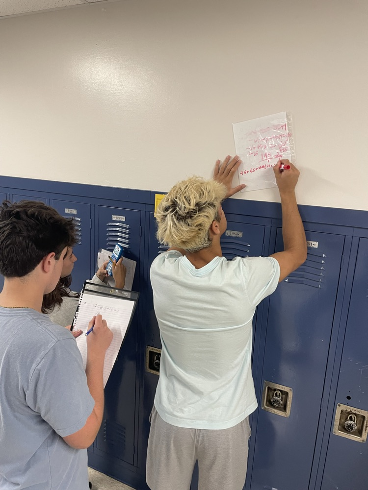 Students practicing review BINGO