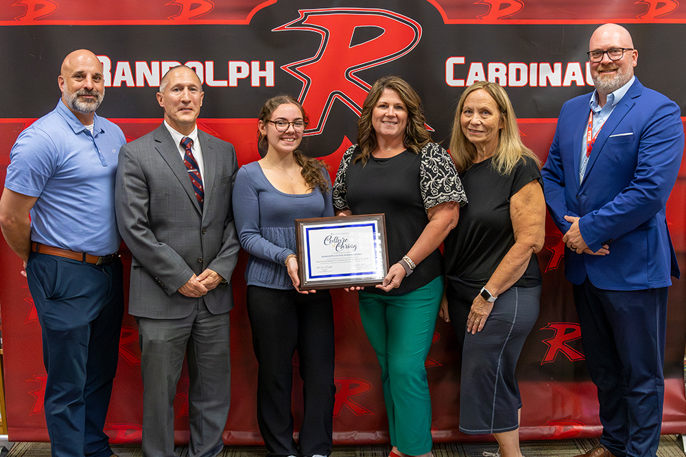 From left: High School Principal Jason Halpainy, NYSSBA Regional Ambassador Kurt Gustafson, Student Board Member Riley Henry, Teaching Assistant Debbie Luce, Board of Education President Julie Milliman, Superintendent Kaine Kelly