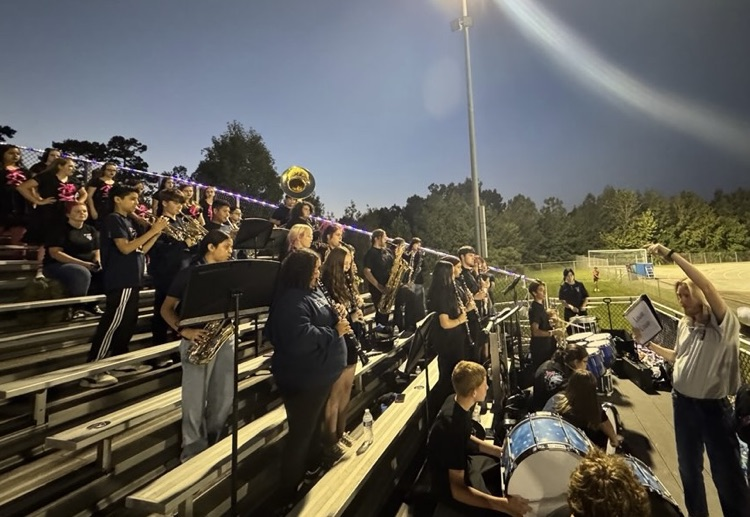 NERMS band students performing with PGHS under the direction of Mr. Connor Beck.