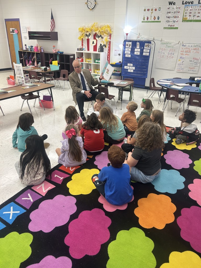 Dr, Gainey reading to students