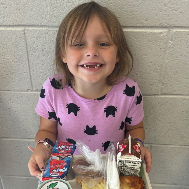 all smiles on early release day with pizza!