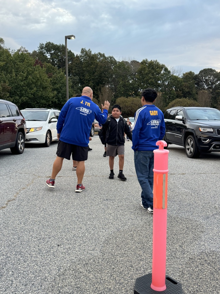 SWRHS soccer team greeting students