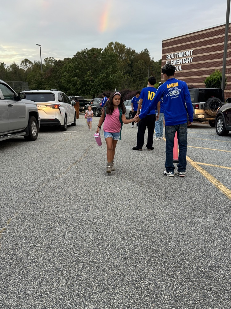 SWRHS soccer team greeting students