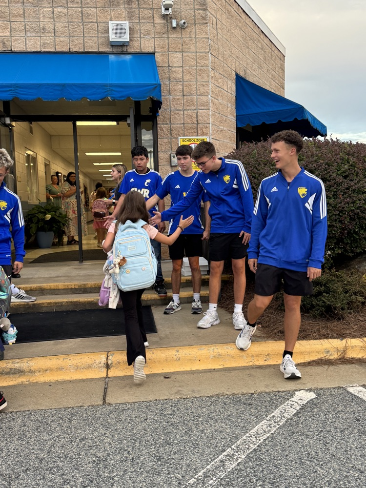 SWRHS soccer team greeting students