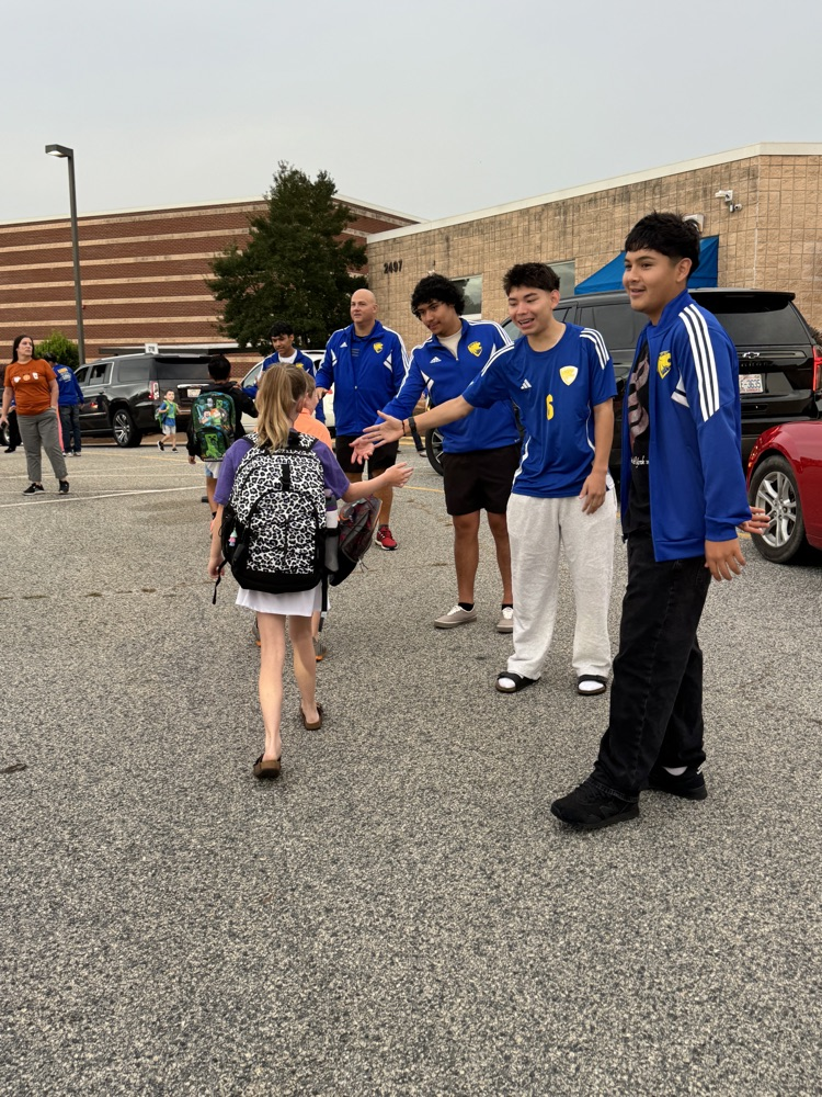 SWRHS soccer team greeting students