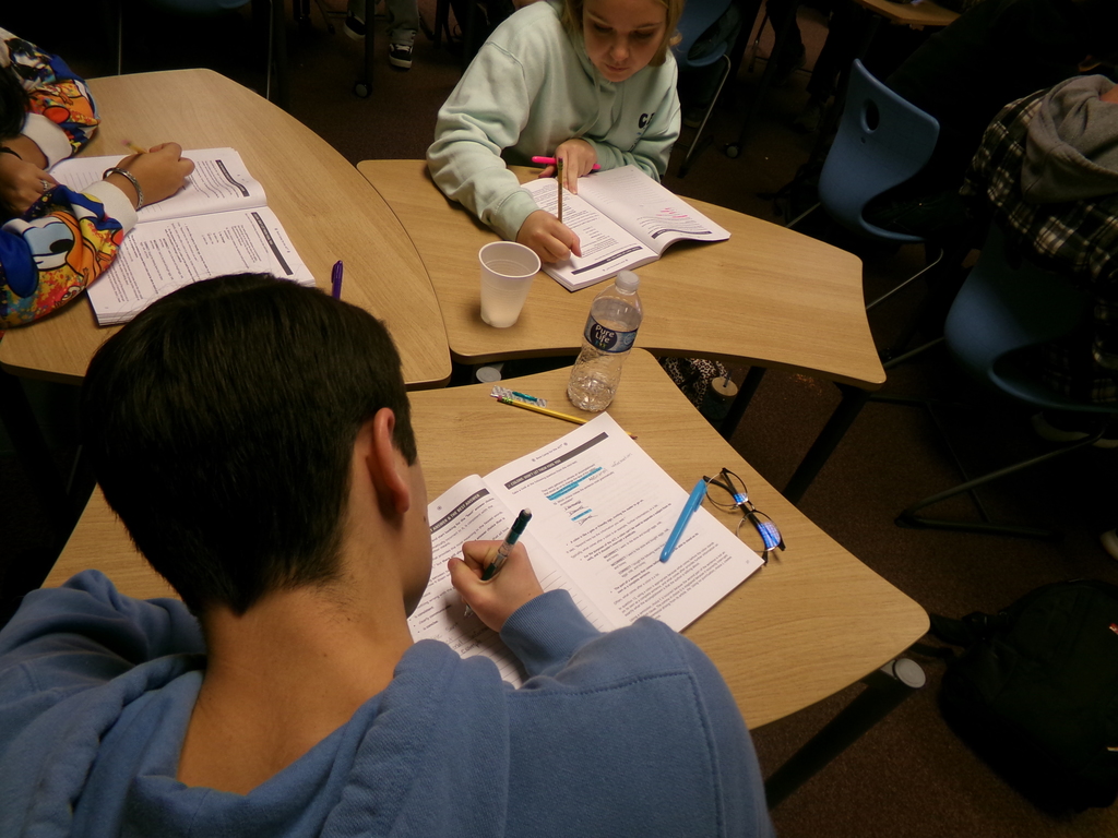 Students working in workbooks