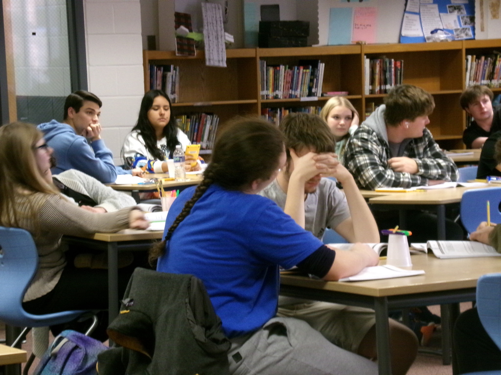 students listening to a speaker