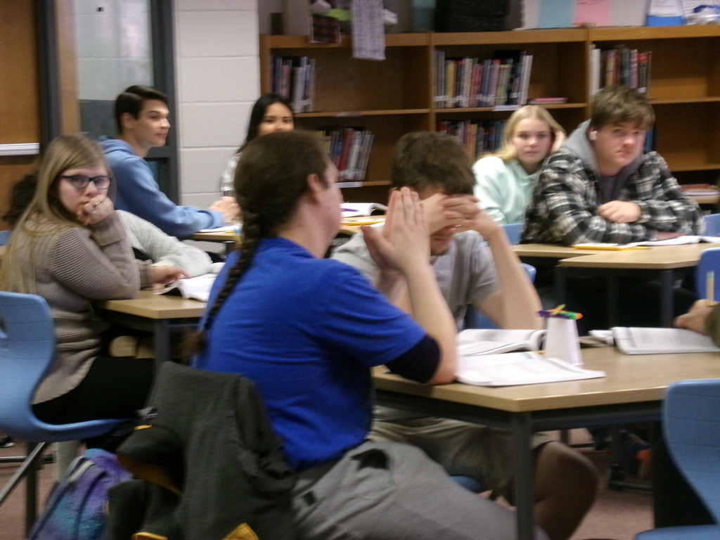 students listening to a speaker
