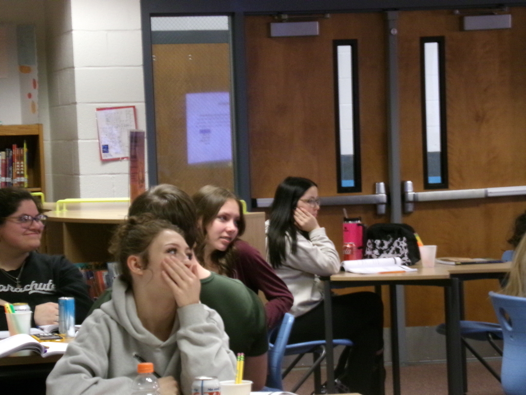 students listening to a speaker