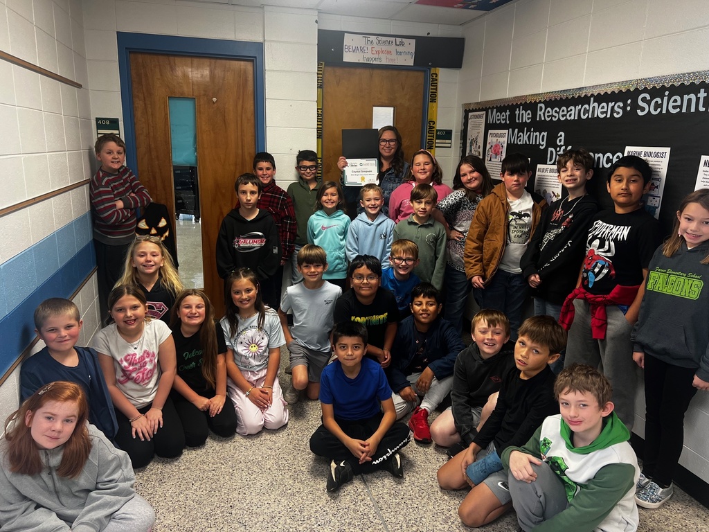 Ms. Simpson standing with her class after receiving her grant.