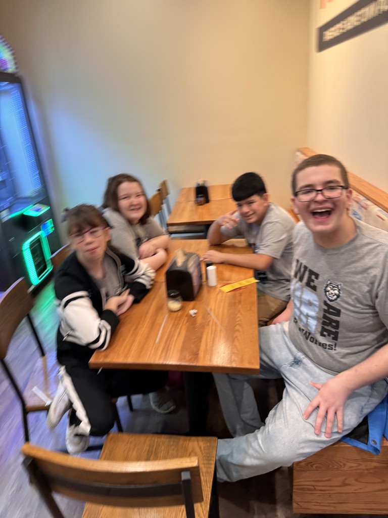 Middle and High school students at a restaurant