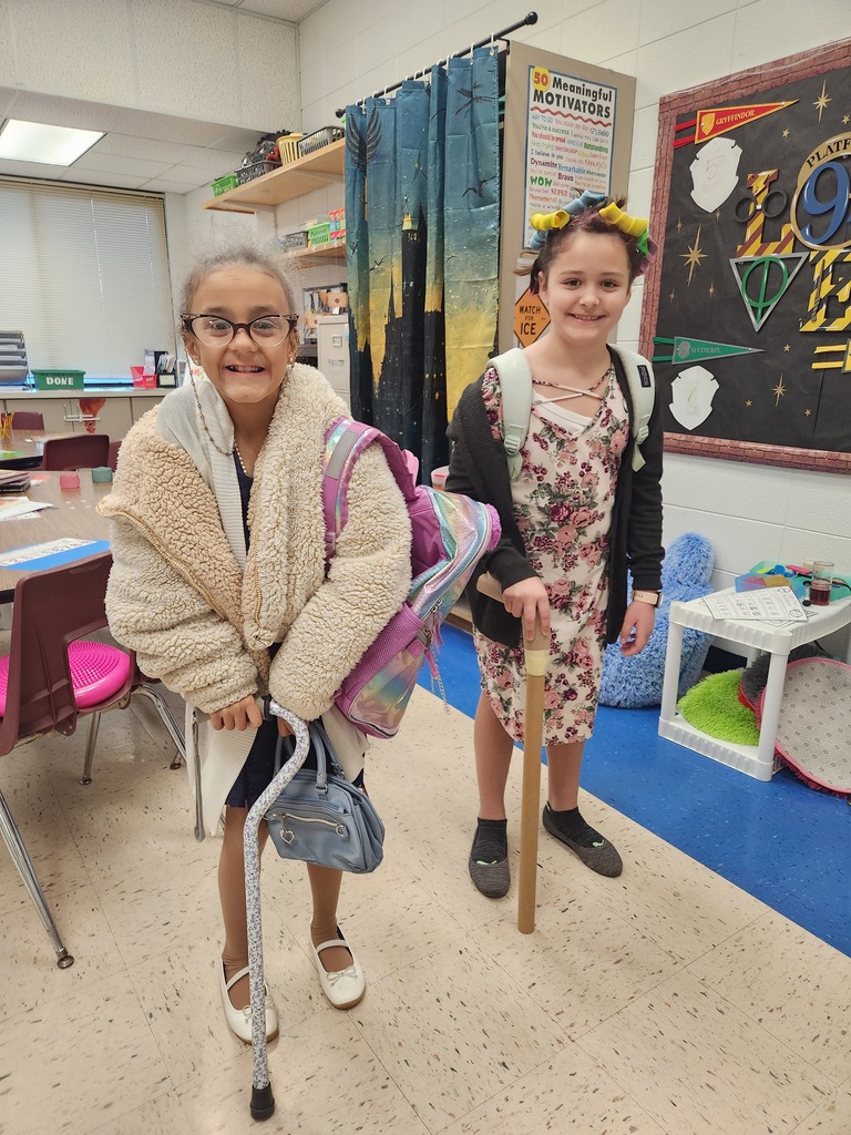 Two students dressed up as old ladies for the 100th day of school.