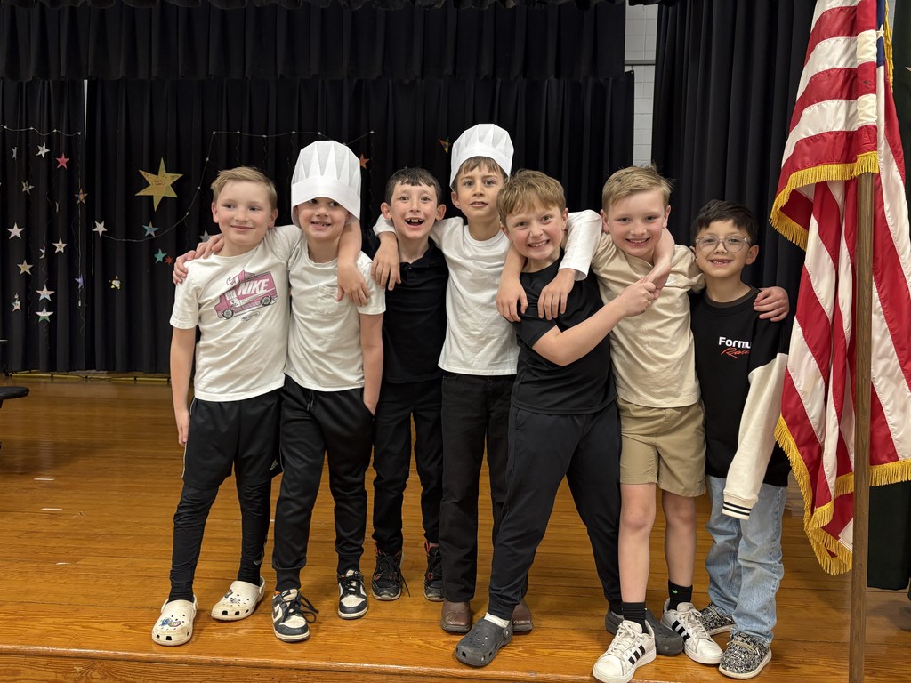 A group of boys getting ready for their performance for Science Night.