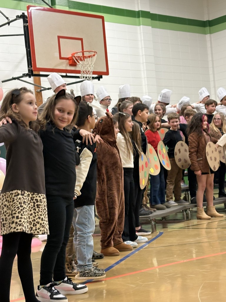 Students singing cookie themed songs for Science Night.