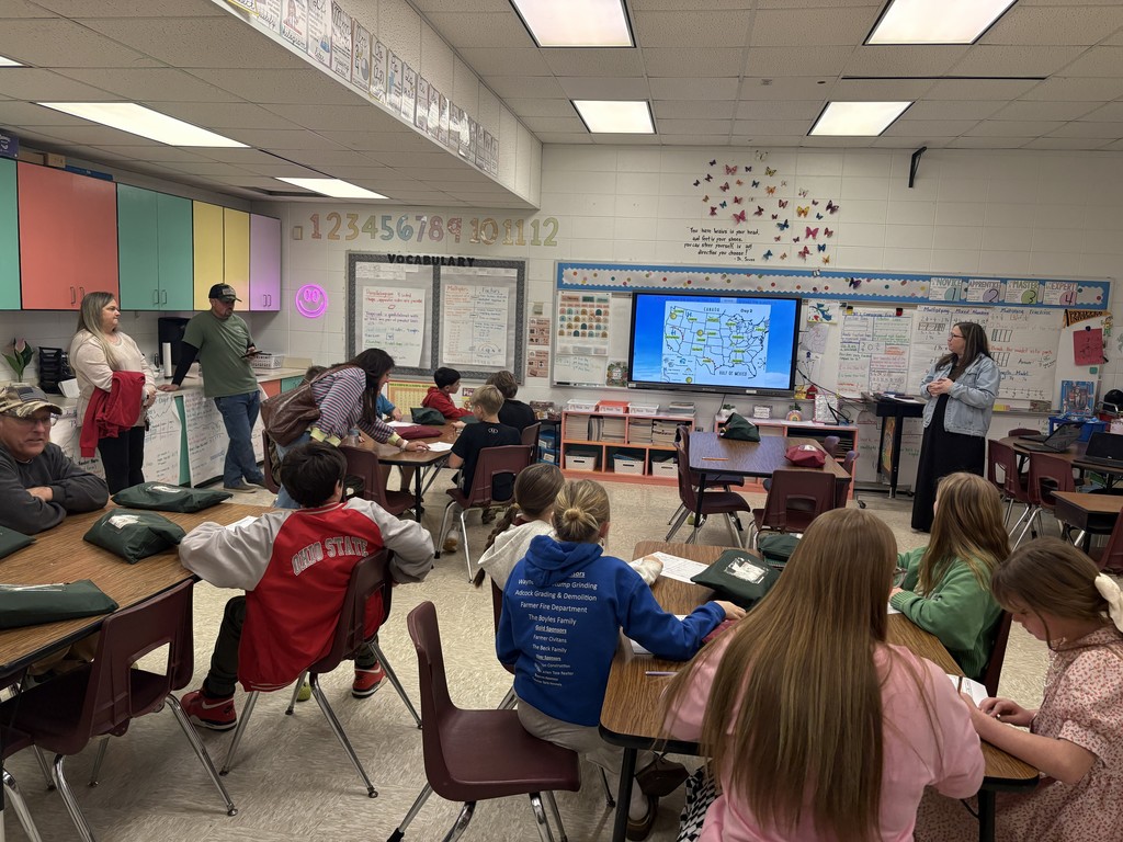 Students learning about science with their parents on Science Night.