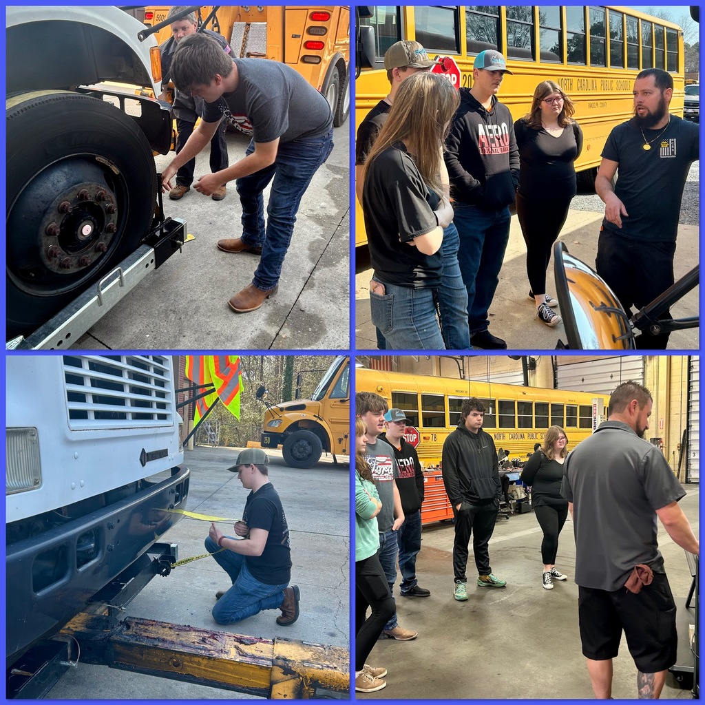 high school students in a bus lot