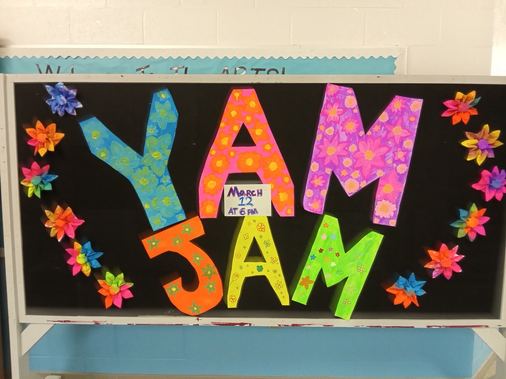 bulletin board with flowers and "Yam Jam"