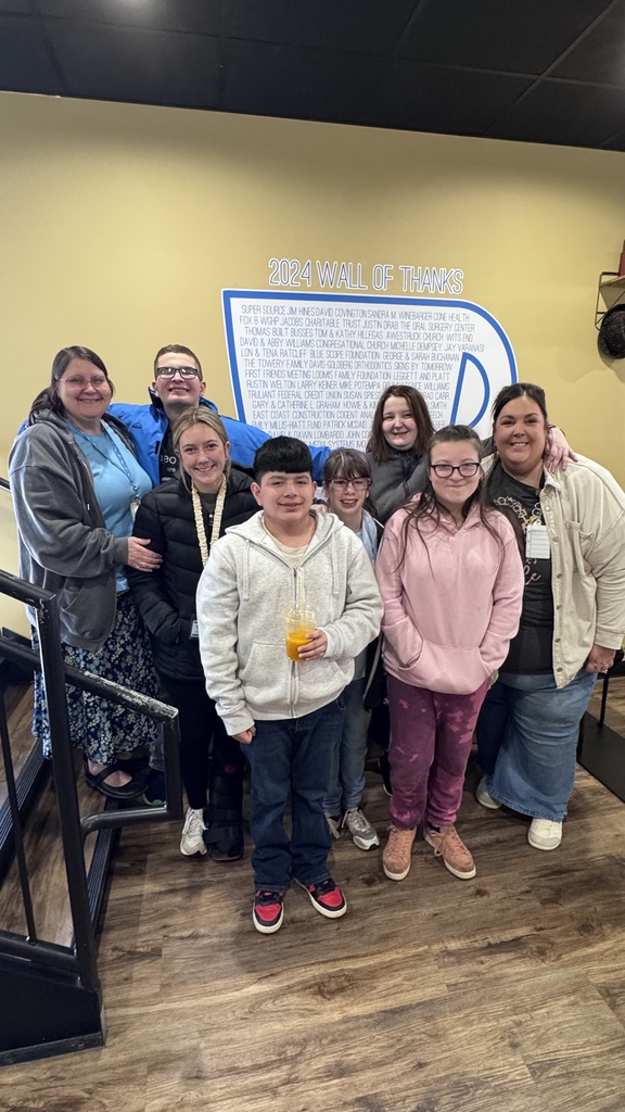 High school students at a restaurant. 