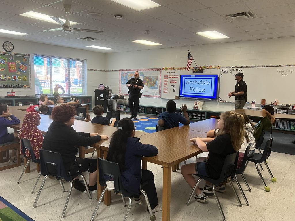 Students listening to a presentation