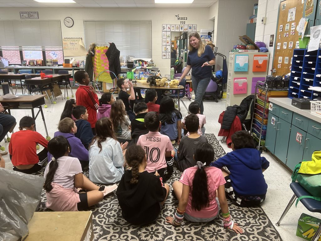 Students listening to a presentation