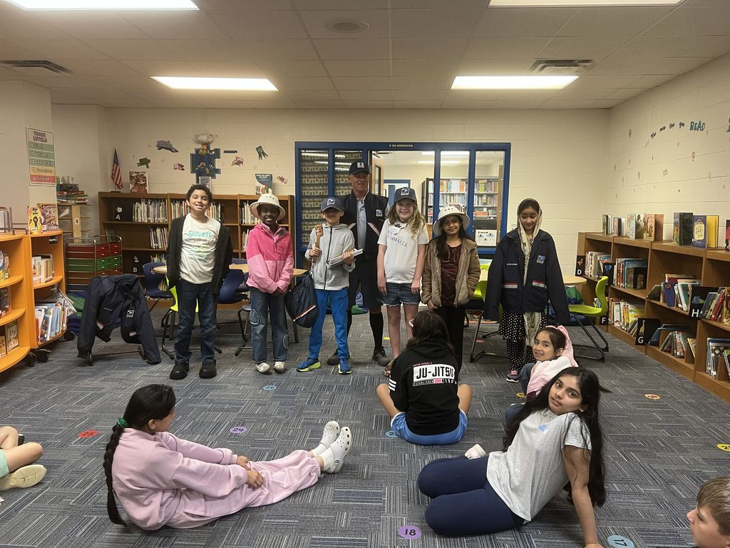Students listening to a presentation
