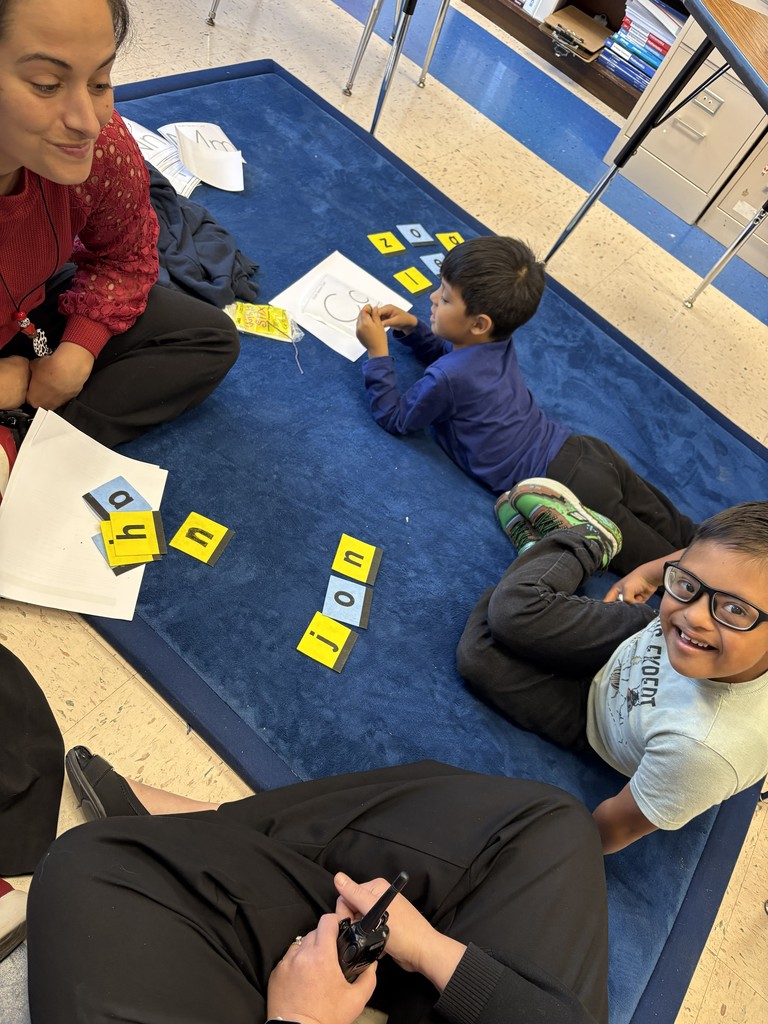 Students working on their letters.