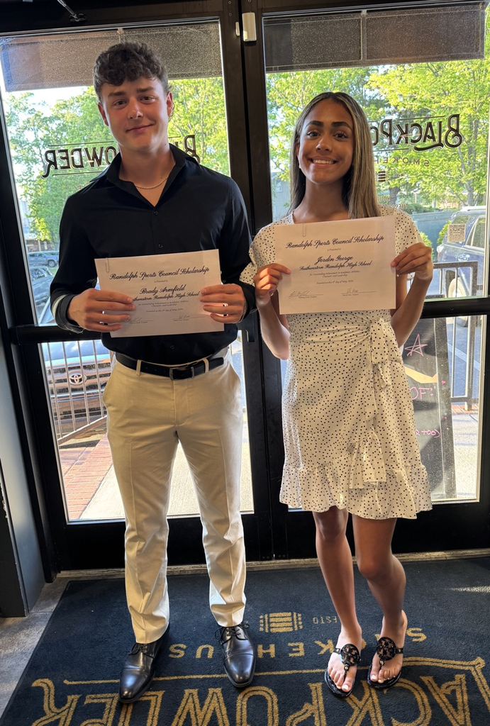 Brady Armfield (left) and Jordin George (right) after receiving the Randolph Sports Council Scholarship award at Black Powder Smokehouse.