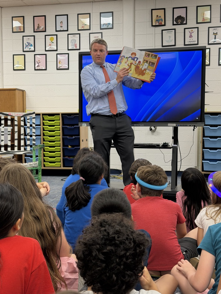 Dr. Cross reading to 2nd Graders