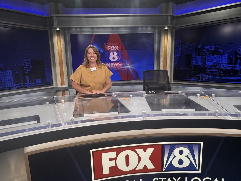 Mrs. Kallam at the Fox 8 news desk