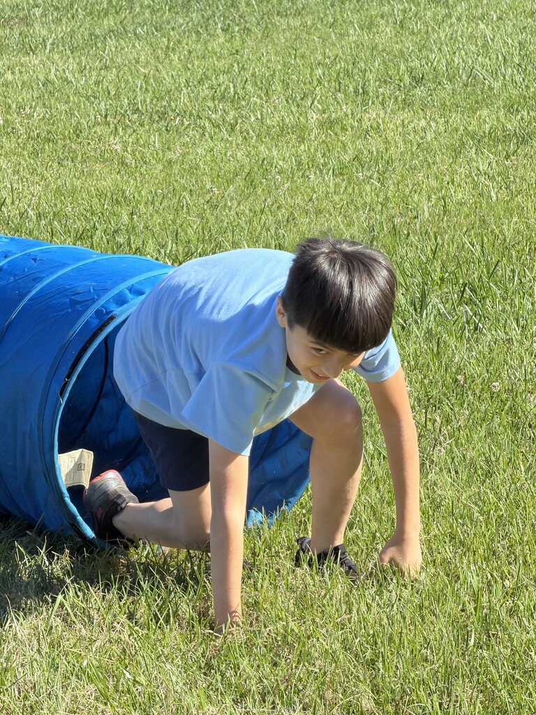 A student emerging from a tunnel.