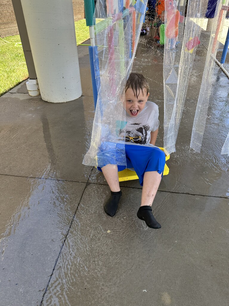 A student going through the car wash a field day.