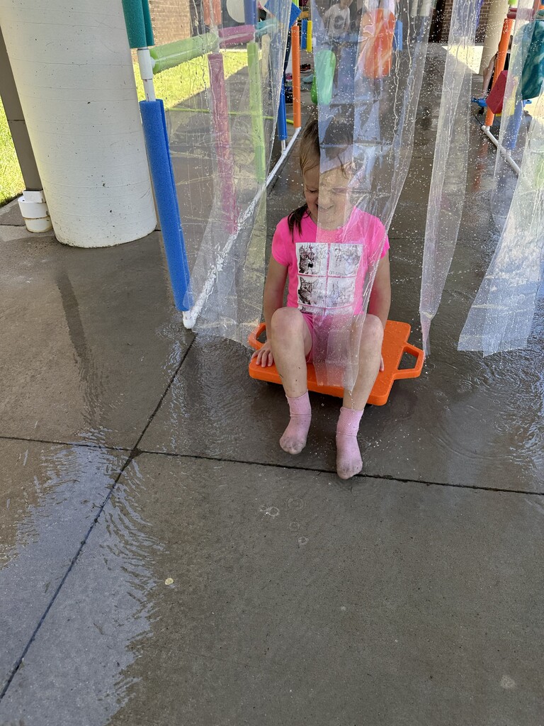 A student going through the car wash a field day.