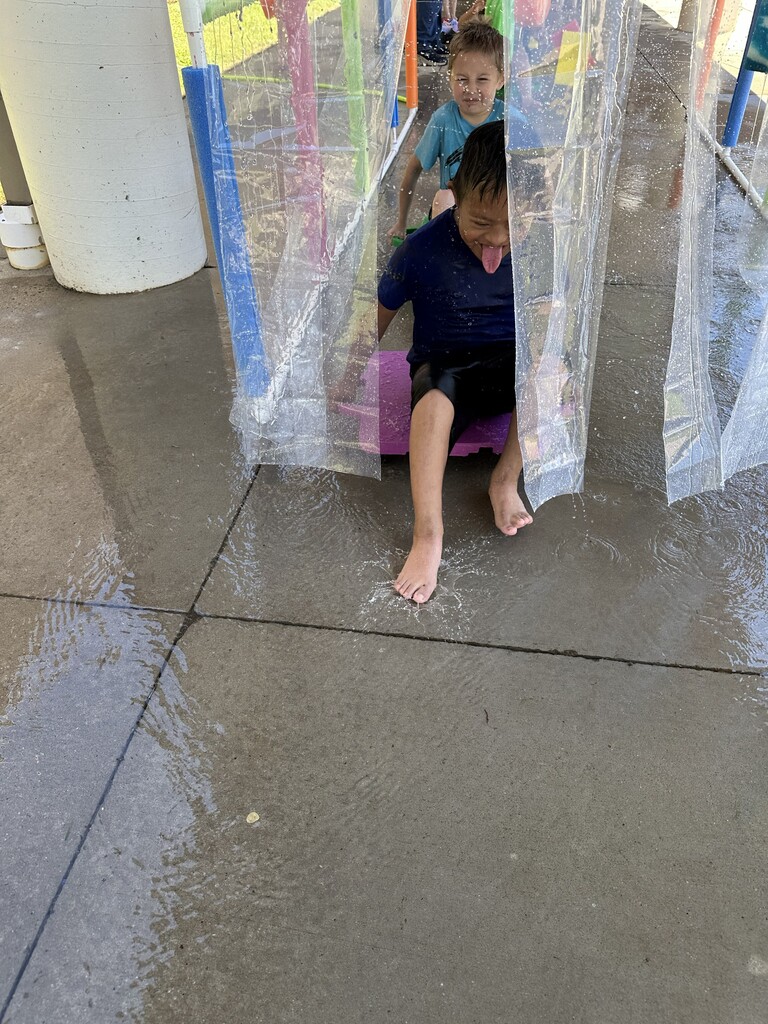 A student going through the car wash a field day.
