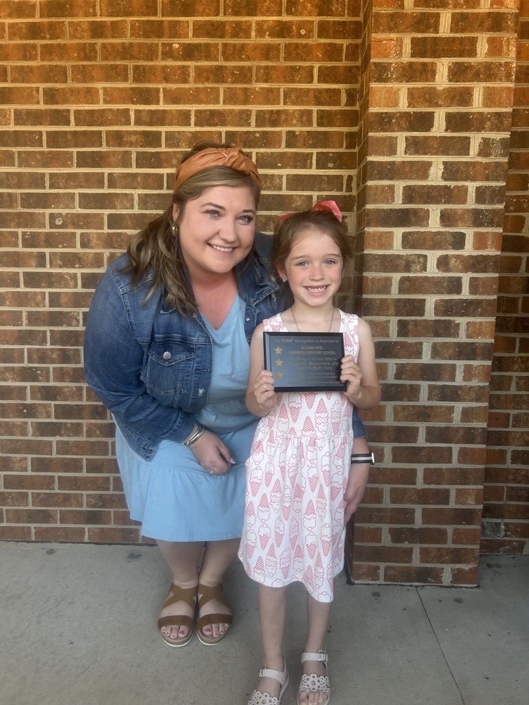 Alyssa Neel with her teacher Ms. Markham receiving her Star3 Student award.
