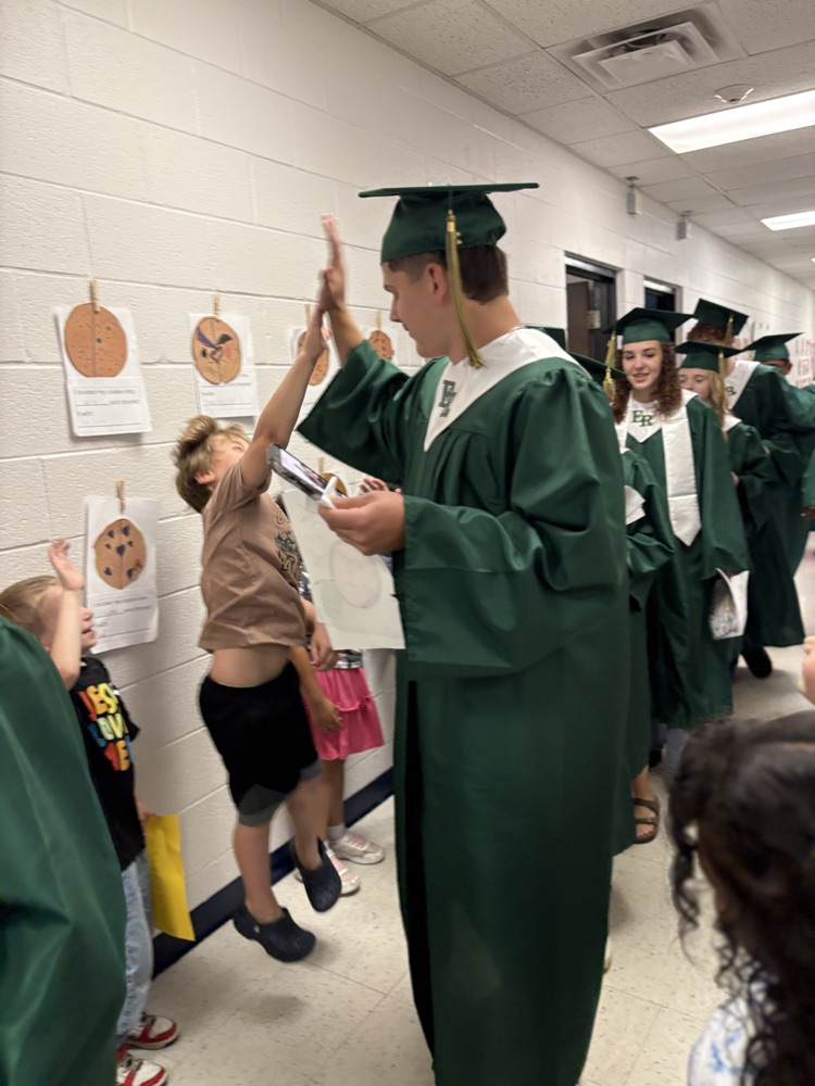 seniors in graduation regalia