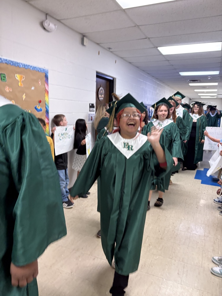 seniors in graduation regalia