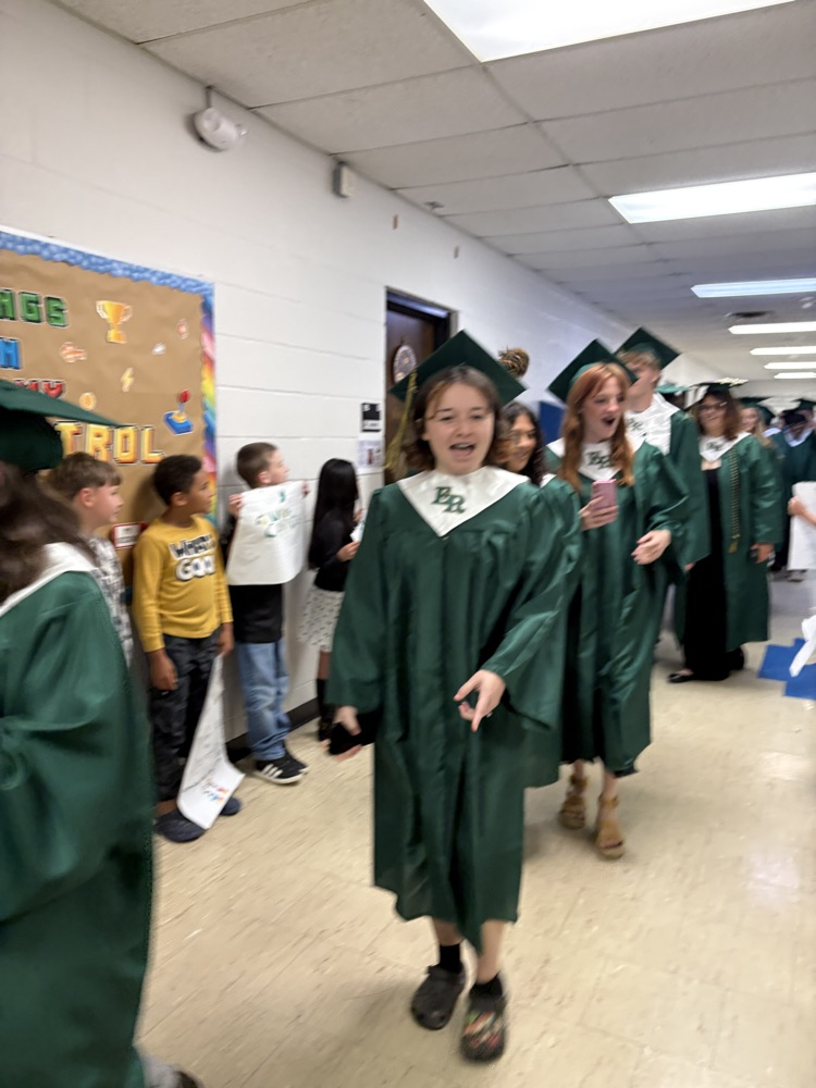 seniors in graduation regalia