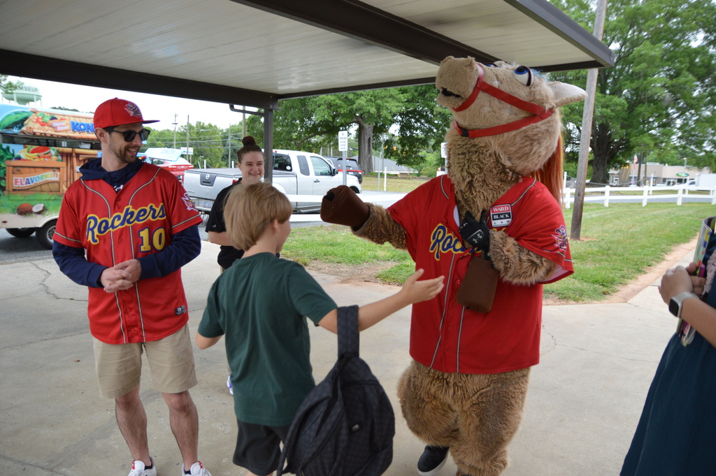 Horse mascot greets students and staff