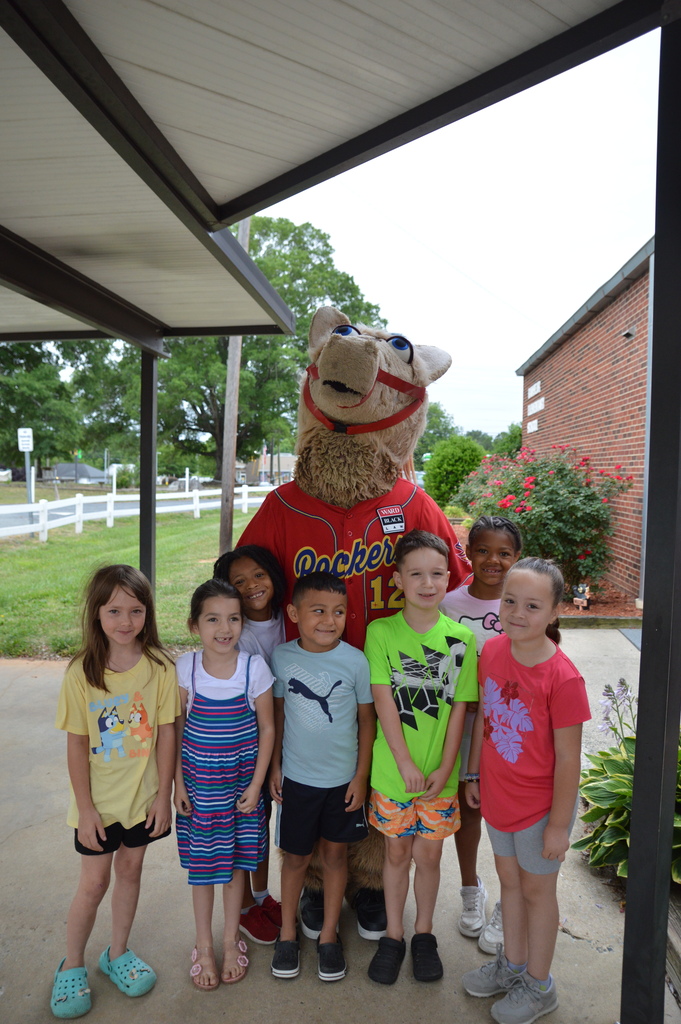 Horse mascot greets students and staff