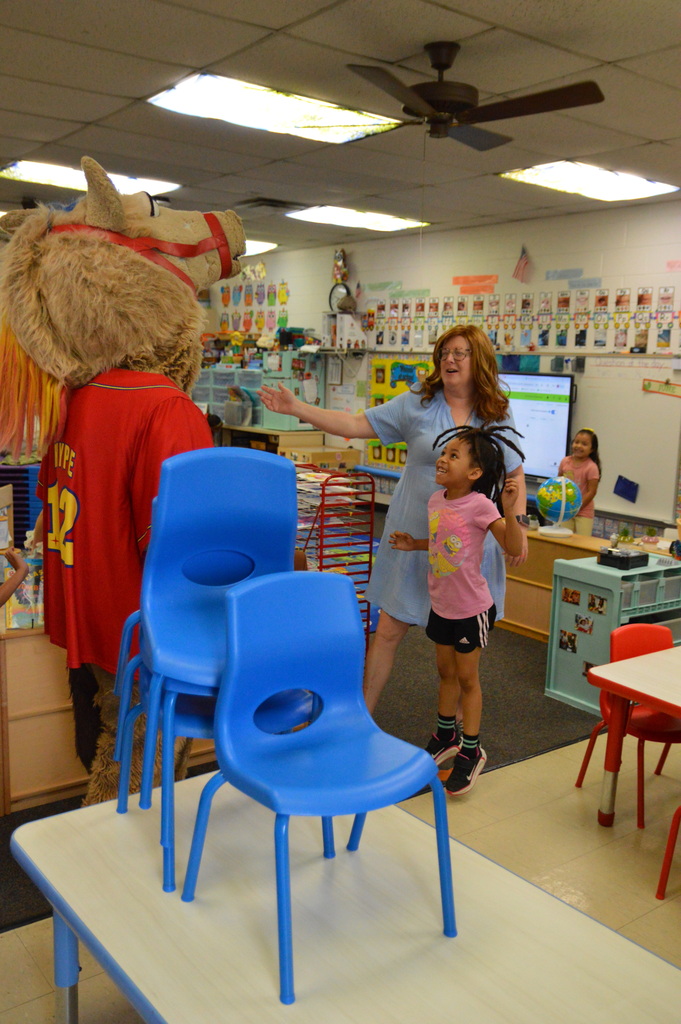 Horse mascot greets students and staff