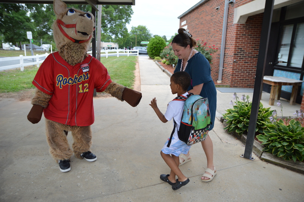 Horse mascot greets students and staff