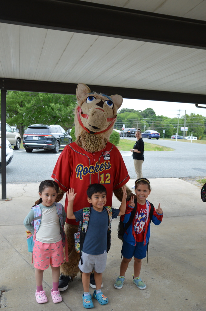 Horse mascot greets students and staff