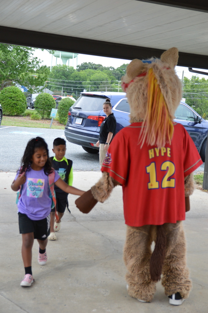Horse mascot greets students and staff