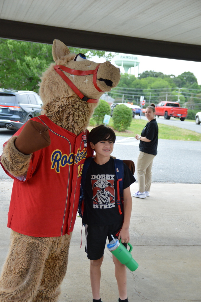 Horse mascot greets students and staff